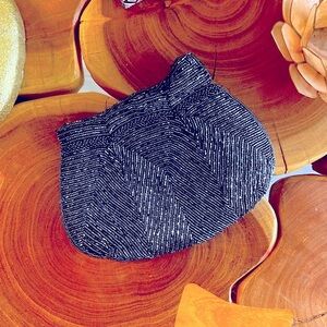 Vintage beaded, gray on gray snap closure clutch.